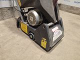 an image of a machine that is sitting on the ground