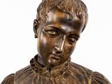 an image of a statue of a young boy with his eyes closed