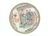 a plate with a picture of a man and woman on it