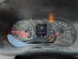 a close up of a car dashboard with a speedometer