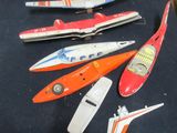 a lot of toy airplanes that are on a table