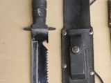 three different types of knives on a table