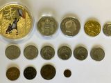 a lot of coins that are sitting on a table
