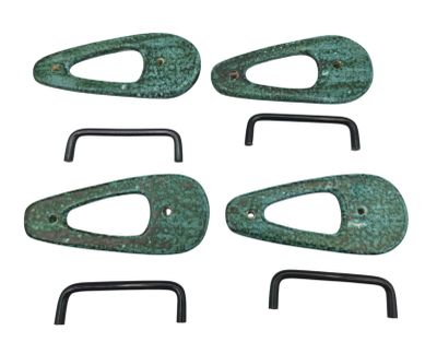 six pieces of green patished metal on a white background