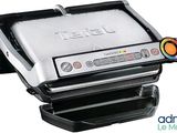 a close up of a tefal grill on a white background
