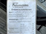 a sign that is attached to the engine of a car