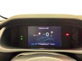 the dashboard of a car with a digital display on it