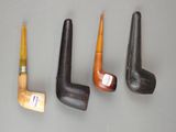 four different types of pipes are lined up on a table