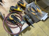 a lot of tools that are sitting on a table