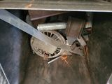 a machine that is sitting inside of a metal container