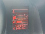 a digital display on the dashboard of a car