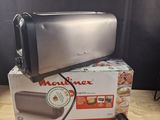 an image of a toaster sitting on top of a box on a table