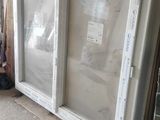 two windows that have been placed on the floor