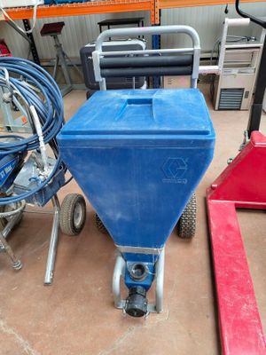 a blue cart that is sitting on the floor