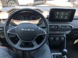 the interior of a car with a steering wheel, dash panel, and dash board