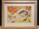 painting of a nude woman laying on a bed in a wooden frame