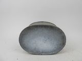 an image of a metal object on a white surface