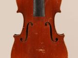 an old violin with a bow on a white background