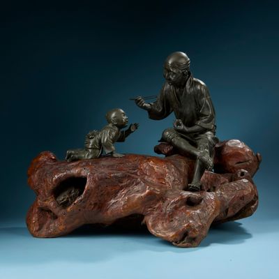 JAPON. Important groupe en bronze à patine brune, vieillard …