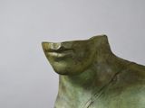 sculpture of a man ' s face with a necklace on his neck