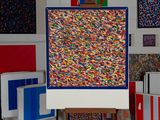 a picture of a painting on a easel in a room