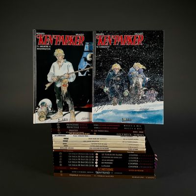 books are stacked on top of each other on a black surface