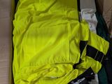 a box filled with clothes and a jacket in it