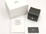a box with a watch inside of it on a table