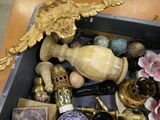 a box full of assorted items sitting on a table