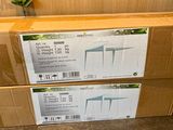 two boxes that are stacked on top of each other