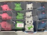a box with a bunch of little plastic animals in it