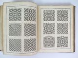 a book with a pattern on it sitting on a table