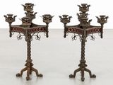 pair of antique brass candelabs with red glass inserts
