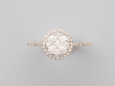 a diamond and white gold ring