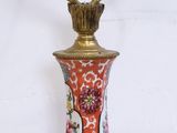 a lamp that is on a table with a lamp on it
