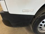 a close up of a white truck with black rims