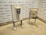 an image of a couple of machines that are sitting in a room