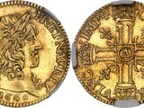 a gold coin with a cross on the front and a crown on the back