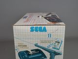 an image of a box with a blue and white model of a plane in it