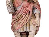 une statue représentant un homme avec un enfant sur l'épaule