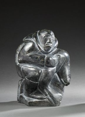 an image of a statue of a man sitting on top of a rock