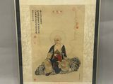 une ancienne peinture chinoise représentant un homme assis par terre