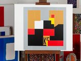 a picture of a painting on a easel in a room
