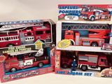 three toy firetrucks and a fire truck in the same box