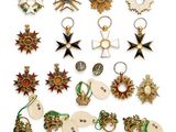 a group of assorted items including a star, sunflower, and other items