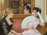 two women sitting on a couch with a fan