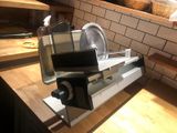 a kitchen counter with a sink and a dishwasher on it