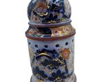an image of a blue and yellow vase with a dragon on it
