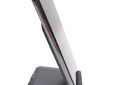 a cell phone that is sitting on a stand