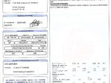 a close up of a document with a picture of a person on it